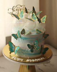 Embracing the delicate beauty of butterflies on this dreamy blue cake.🦋💙 #CakeArt #ButterflyCake #BakingJoy #bluecake