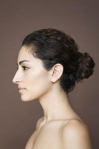 Young Woman in Profile. Profile of woman with no visible top. Vertically framed #Sponsored , #ad, #paid, #Woman, #woman, #Vertically, #Profile