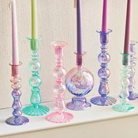 Gorgeous colourful curved glass candle sticks, various shapes and sizes, hold a normal candle. Perfect for practical use or just decoration. Mix and match to find your perfect match. Small Bone Style:H19.5cm/D7cm,suit candle diameter 2-2.5cm Ball Style:H19cm/D8.5cm,suit candle diameter 2-2.5cm Big Bone Style:H25cm/D8.5cm,suit candle diameter 2.5-2.9cm