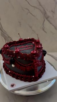 Fancy burgundy and black heart cake