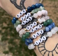 Excited to share this item from my #etsy shop: Angel Number Crystal Bracelets - stretchy crystal angel number bracelets - lucky number fairy bracelet #crystal #bohohippie #evileye #ethicalgemstones #gift #holidaygift #angelnumbers