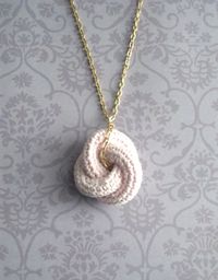 Eternal love knot. I usually don't go for crocheted jewelry, but I actually like this one!