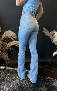 Kimes Ranch Jennifer Light Wash Trouser Sizing: Missy Jean Size/Inseam Length in inches Fabric: 99% Cotton | 1% Spandex Fit: Ultra High Rise, Super Wide Flare Leg Details: Hand sanding on light-wash denim with whisker details Construction: 12.5 Oz. Denim