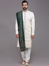 Here is the latest trending design of the silk white sherwani for wedding wear. 👉This comes with a matching dupatta. 👉Inbox us for any Information 👉Tab on the image to buy this one online.