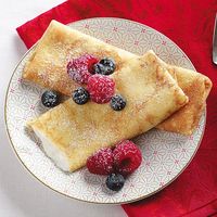 These cheese-filled, berry-topped blintzes taste just as mouthwatering and special as they look. —Laura Fall-Sutton, Buhl, Idaho