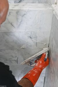 Installing Marble Tile in our Master Bathroom. #camitidbits #marble #marblebathroom #tileinstallation #installingtile #marbletile #carraramarble