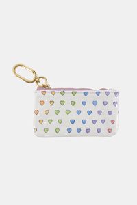 With you wherever you need to go, the Disco Hearts Coin Pouch is a cute cotton canvas pouch for credit cards, cash, and coins. Clip it into your bag or on your keys when you're out and about. Product Details 100% Cotton Canvas with Protective Poly Coating Water-Resistant Wipe Clean Measures: 4.7"W x 2.8"H x 0.4"D Imported