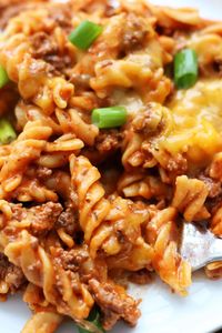 That Casserole--seasoned ground beef with protein pasta, tomato sauce, cream cheese, cheddar and green onions. An easy high protein Instant Pot meal. 