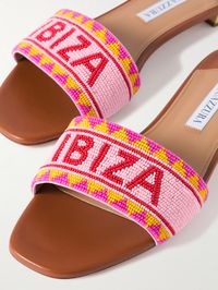 Find AQUAZZURA Ibiza Beaded Leather Slides on Editorialist. Whether you're traveling to Ibiza or dreaming of making the trip, Aquazzura's slides will be a beautiful addition to your warm-weather wardrobe. They're made from leather and beaded to spell out the name of the Mediterranean destination. Team yours with the matching bag in our edit.