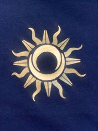 T-Shirt made to order with the Apollo Tattoo Studio Sun/Moon Logo.