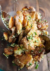 smashed potatoes tossed in garlic, lemon zest, parsley, parmesan