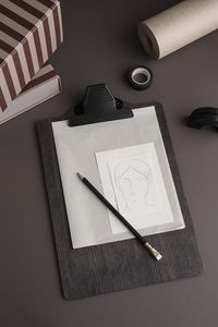 Organise your thoughts in the office, or present the menu of the evening for your guest in a stylish way. The black-stained wooden clipboard has a sleek look with the black metal clip for paper, fabric samples, or little notes.