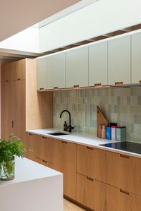 The beautifully mellow Malvern Road project features Plykea Formica Seed and oak kitchen fronts, with oak semi-recessed handles. All using IKEA Metod or Sektion cabinets. Interiors: Sandler Wray / Home Milk Architect: James Dale Architects Photography: Neil Perry Photography #plywoodkitchen #birchplywood #plywood #ikeahack #kitchenideas #kitchentrends