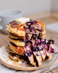 There is nothing more comforting than a stack of fluffy pancakes. It gets even better when they are easy to make in just one blender, with budget-friendly simple ingredients like rolled oats, bananas, and cottage cheese. To kick it up a notch, we are adding juicy blueberries for a burst of summer flavor.