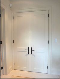 White interior doors with black hardware photo