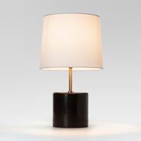 The accent table lamp from Project U adds a touch of modern style to any room. It gives off just the right amount of soft light and the genuine black marble contrasts beautifully with the brass accents.