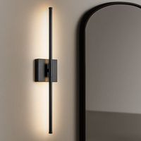 Full of sleek, modern minimalism, this semi-flush mounted sconce illuminates almost any spot you could think of in your home. Crafted from iron with a bold finish, it features a square backplate and a bar that can be installed vertically or horizontally, depending on your available space and aesthetic. Built into the rod is an LED strip that faces against the wall, casting a bold and dimmable glow in your bedroom or over your bathroom vanity. Our favorite part? This wall light is rated for damp