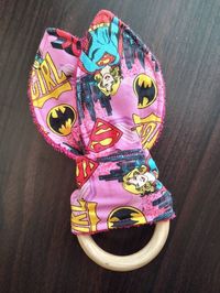 Check out this item in my Etsy shop https://www.etsy.com/listing/1151493412/superhero-wooden-teether-bunny-ear