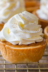 Mini Pumpkin Pies are easier than pumpkin pie and they are the ultimate Fall treat. You’ll love the buttery crust and creamy pumpkin center.