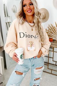 Look Absolutely "Diorable" In This Parody Graphic Crewneck! The Corded Fabric Is What Makes This Sweatshirt Unlike Any Of Your Other Ones! $53, FAST AND FREE US SHIPPING!