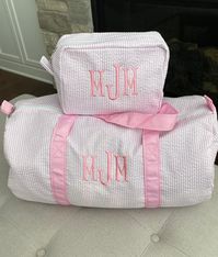 "Personalize this adorable seersucker travel set to make the perfect gift. Set options: 1. Duffle bag only 2. Toiletry bag only 3. Duffle + toiletry bag set Great for trips to grandparents, dance, sports, daycare, travel, etc. Use the added toiletry bag to hold all your toiletries, hair bows, or small toys. Great way to stay organized! Monograms are typically embroidered in first initial, LAST initial, middle initial order for girls. Some may want their monogram in first, middle, last order. Ple