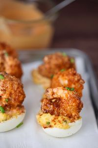 These fried shrimp deviled eggs are the perfect little bit! They're crispy, spicy, sweet, and creamy. The ultimate appetizer!