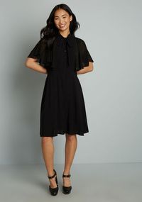 The gentle fluttering movement of this unconventionally elegant black dress from Hell Bunny London is poetry in motion. This vintage-inspired dress is a versatile and unique addition to your collection.