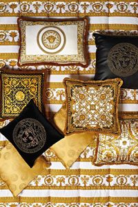 Inject some iconic Italian style into your interior with this cushion from Versace Home. Made from 100% cotton with a plush polyester filling, this luxury cushion is embellished with Versace’s signature Medusa head motif in gold and black tones.