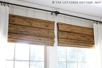 Mount blinds above window to get more height. I like the look of these wooden/sea grass blinds with the white curtains and the thin dark rods. The Lettered Cottage