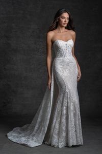 This beautiful on-trend all lace wedding dress has a detachable train and corset-inspired bodice. Try on this Allure Couture style at Laura and Leigh in the Philly area!