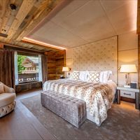 Thoughtfully designed for comfort, luxury and a good night's sleep. All bedrooms at Ultima Crans have balcony access, dressing rooms and ensuites.   #luxurychalet #luxurydesign #luxurybedroom #bedroominterior #bedroomdesign