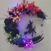 Flying Witch Moon Wreath, Halloween Wreath, Witchy Wall Decor, Gothic Door Wreath, Spooky Home Decor, Rainbow Moon Wreath, Halloween Gift This beautiful rainbow and black witch wreath is both unique and fun. The witch is attached to the wreath but appears to be flying through the moon! Perfect for Halloween lovers. Give as a gift to anyone who loves witchy decor.  Made with a grapevine base painted black. Faux floral. Witch wood cut out painted black. Purple fairy lights (on/off flat switch battery) Hanging ribbon attached. Due to the style of this wreath; it is recommended for a wall, not a door.  Thank you for visiting my shop Www.jessmadedesign.etsy.com Www.facebook.com/penguin478  Www.instagram.com/jessmadedesignetsy