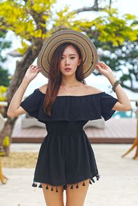 spring / summer - street chic style - street style - party style - beach style - summer outfit ideas - black off the shoulder pom pom romper + blue and cream wide brim fedora + black and gold sandals