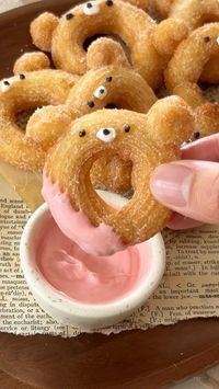 let’s make mini bear churros 🐻  churro recipe  • 1 cup water  • 1/4 cup unsalted butter  • 1 tbsp sugar  • 1/4 tsp salt  • 1 cup AP flour  • 1 large egg  • 1/2 tsp vanilla extract  1/3 cup sugar and 1/2 tsp cinnamon (for coating)  instructions  • 1. Heat water, unsalted butter, salt over medium heat and bring to boil  • 2. Reduce heat, add flour, and stir mixture with a rubber spatula  • 3. Let dough form and transfer to large mixing bowl to cool for a few minutes  • 4. Add vanilla and egg and whisk with electric mixer until smooth  • 5. Transfer to two different piping bags (if making bears). I used Wilton tips 21 and 4B  • 6. Create one large circle with the bigger piping tip and then use the smaller tip for the ears  • 7. Fry the churro for 1-2 min per side until golden brown. Oil shou