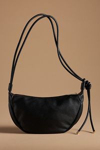 Polyurethane; polyester lining Two inner slip pockets One inner zip pocket Zipper styling Imported | Convertible Sling Bag by Mali + Lili in Black, Women's, Polyester/Polyurethane at Anthropologie