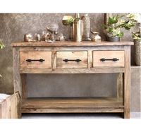 Distinctive chest of drawers or sideboard made of mango wood - great in the living room and dining area - Authentically manufactured by experienced carpenters in a small family business. This sideboard features a combination of drawers and a large shelf in a natural brown colour.