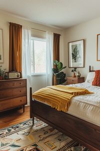 Explore mid-century modern bedroom designs that feature clean lines and organic forms, creating a minimalist yet chic space. See more ideas here.