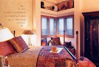 southwestern-decorating-ideas...black cabinet with wooden window trim and your wooden bed...wall can be a bit darker!