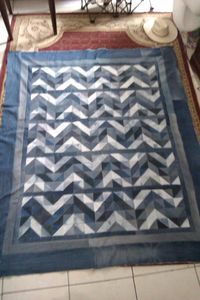 Recycled denim quilt.  Chevron block pattern.