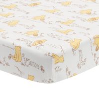 This breathable 100% cotton fitted crib sheet features Classic Pooh in a variety of poses. Winnie the Pooh is holding his favorite honey pot, interacting with a squirrel and a dragonfly, and wandering through the woods. The crib sheet has elastic all the way around ensuring a safe and secure fit on a standard-sized cri