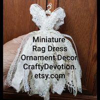 Crafty Devotion is found on Etsy. Visit the handmade section for a selection of finished art dresses or a kit to make your own.