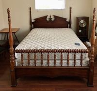 PLEASE NOTE- SHIPPING IS NOT FREE!  PLEASE CONTACT US WITH A ZIP CODE FOR SHIPPING QUOTE PRIOR TO PURCHASE.  SHIPPING IS NOT INCLUDED IN THE LISTING PRICE AND WILL BE INVOICED SEPARATELY.    -   SHIPPING IS NOT FREE. PLEASE MESSAGE PRIOR TO PURCHASE WITH YOUR ZIP CODE TO GET AN ACCURATE SHIPPING COST. Vintage Jenny Lind style Full spindle bed frame.  Beautiful antique Pennsylvania cherry bed frame. Size full or double. Excellent condition. Full size wood Spool Bed.   The bed is complete with Hea