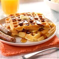 Pecan Waffles Recipe -I've tried for years to duplicate a delicious waffle I ate at a restaurant chain here in the South. This is the closest I've come, and they're crisp and nutty. Butter and maple syrup are my family's favorite toppings. Why not serve them for your holiday brunch? -Susan Jansen, Smyrna, Georgia