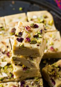 3 main ingredients and 5 minutes prep time is all you need to make this rich and decadent fudge. This fudge recipe has endless variation. Get creative! Makes great edible gifts or last minute treat for pot luck and parties. Included Indian style fudge (burfi ) recipe #fudge #microwave