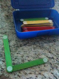 Put velcro dots on the ends of popsicle sticks. Kids can make letters or shapes over and over again.