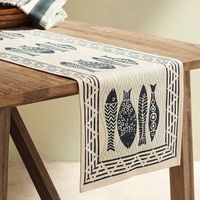 This indigo Fish Block Print Table Runner is made from super soft 100 percent cotton.