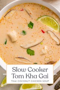 This slow cooker version of my best-ever tom kha soup recipe (or Thai coconut chicken soup) is absolutely perfect… and made to be easier than ever! Light, yet filling and full of tangy flavor, it's the best tom kha gai recipe I've ever made or tried and is so creamy, easy, and delicious.