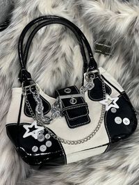 ⚡Buy 2023 Star Chain Embellish Patchwork Buckled Shoulder Bag White ONE SIZE under $29.00 in Bags at AnotherChill.com Online. Style: Casual/Street/Vintage/Y2K/Sweet/Punk/Hip Pop. Material: Canvas, Pu Leather. Usage: Shoulder Bag. Details: Make a statement with our Starry Nights Chain Shoulder Bag. Featuring a unique patchwork design with star chain embellishments, this bag is perfect for adding a touch of glamour to your casual, street, or vintage-inspired outfits. The buckle strap closure adds