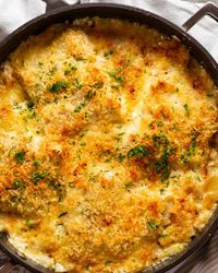 Creamy baked fish on potato gratin