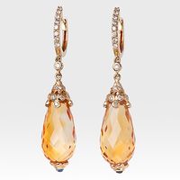 These fabulous 14K Gold Sapphire Citrine Diamond Drop Earrings showcase 2 orangey yellow citrine briolettes totaling 30.57 ctw, 2 sapphires and accentuating round diamonds. Featuring a lovely design, these citrine and diamond drop earrings are simply irresistible.